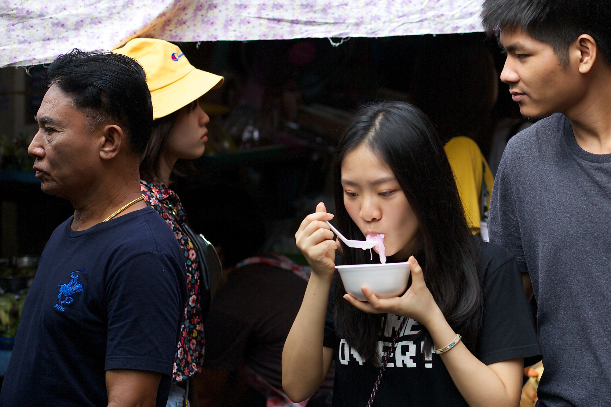 girl slurping dessert